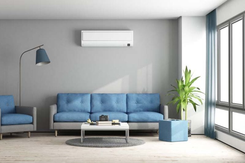 Image of ductless system above a couch. Ductless Mini Splits for Comfortable and Healthy Living.